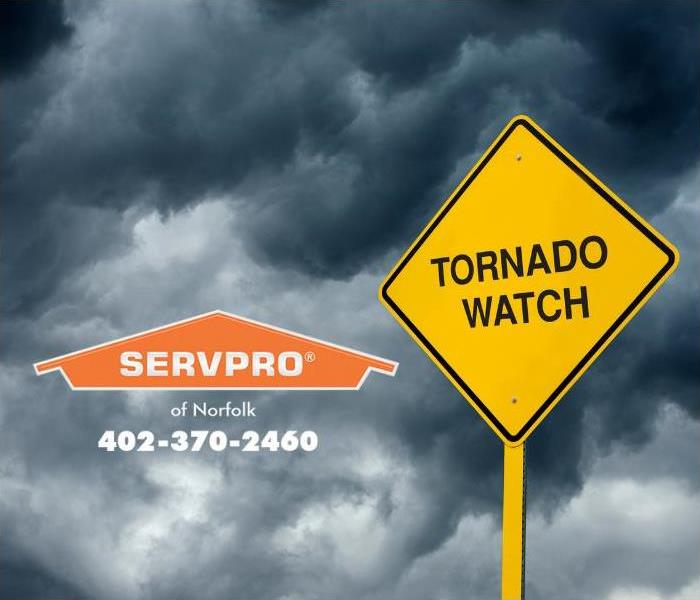 A “tornado watch” sign is shown.